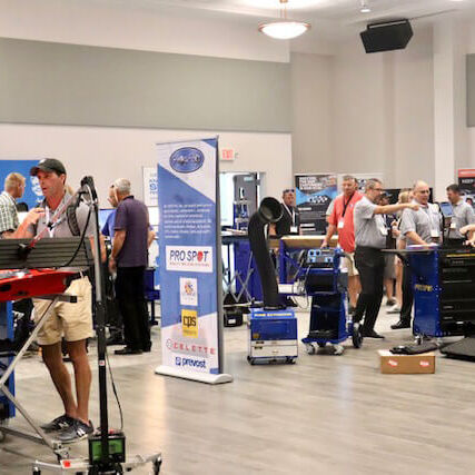 SCC Conference people milling around floor